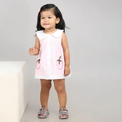 Adorable light pink A-line dress with white accents and cute strawberry embroidery